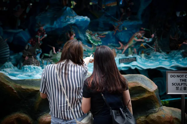 A team playing Journey to the End and Back at Haw Par Villa